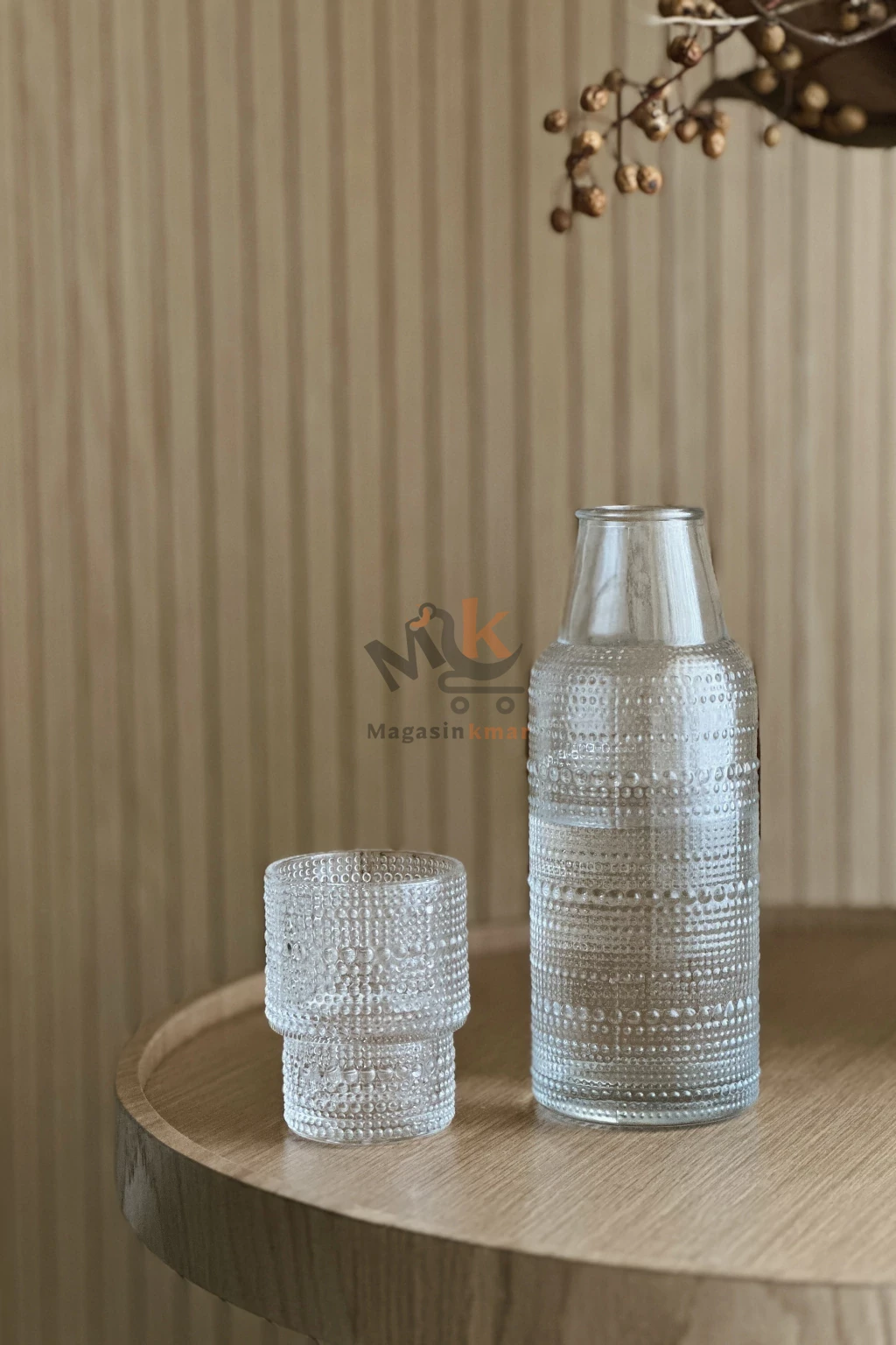 Bouteille en verre avec verre intégré